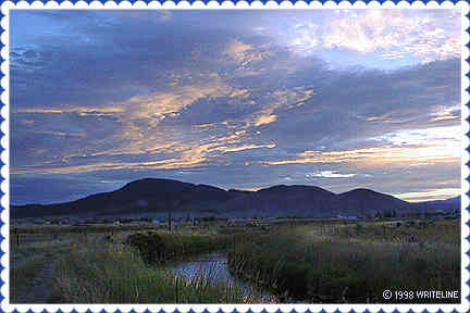 All images Copyright &copy; 1997 - 2000 WriteLine. All Rights Reserved. Setting Sun over mountains